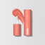 Front view of the MoistureGlow™ Plumping Lip Color in shade Baby Coral. 