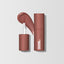 Front view of the MoistureGlow™ Plumping Lip Color in shade Miss Rose. 