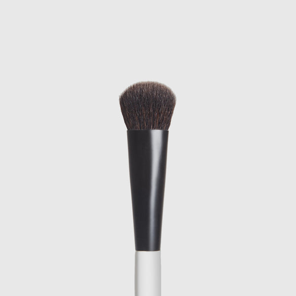 A gif of Makeup By Mario's F5 Concealer Brush spinning.