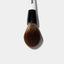 F2 multi-use bronzer brush features a large fluffy tapered side of the brush. 